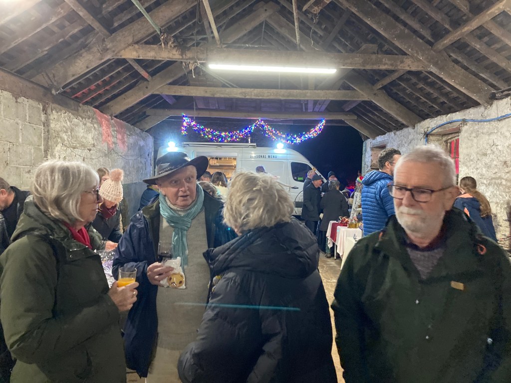 A festive carol service was held at Home Farm, Arlington, Devon on 17 December 2025. Credit: John Mann